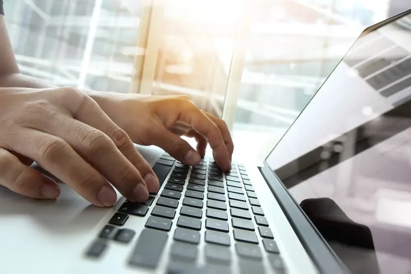 Double exposure of business man hand working on blank screen laptop computer on wooden desk as concept (3)